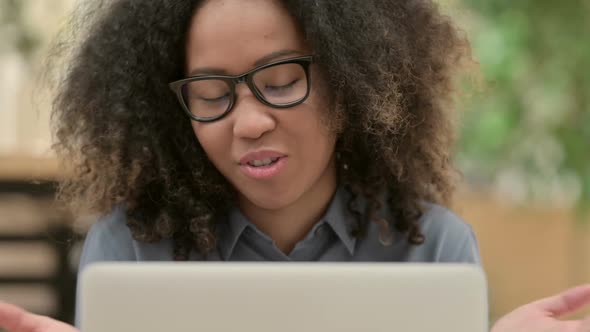 Close Up of African Woman Doing Video Chat on Laptop