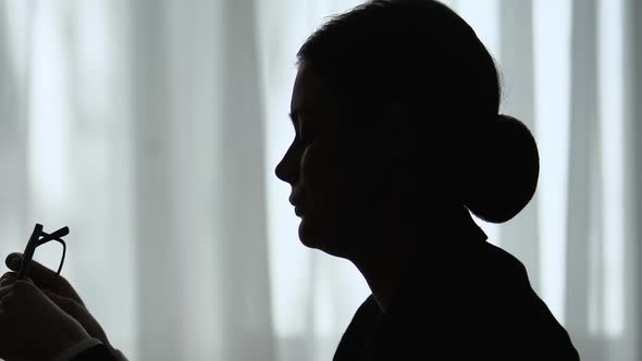 Female Silhouette Wearing Glasses for Computer Reading, Eye Strain, Fatigue