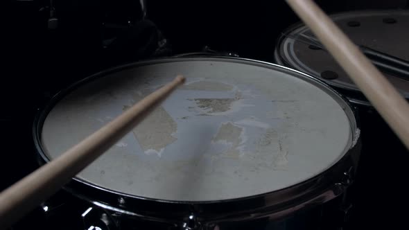 the Drummer Plays with Sticks on a Snare Drum Home Lesson Training