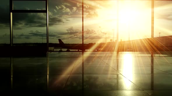 Silhouettes of Passengers at the Airport During Sunset.
