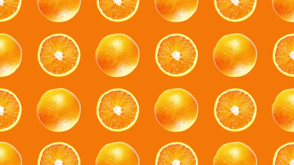 Decorative Pattern Made of Cut and Whole Juicy Orange Fruits