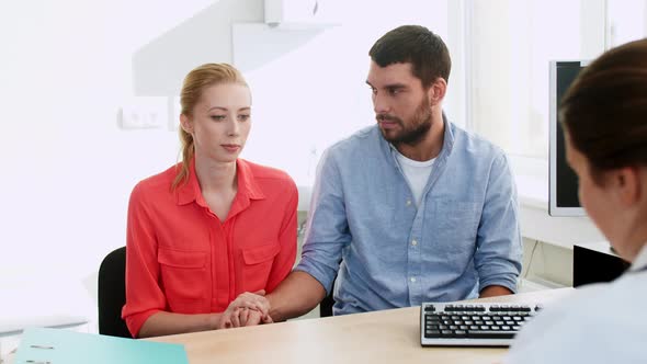 Couple Visiting Doctor at Family Planning Clinic 3