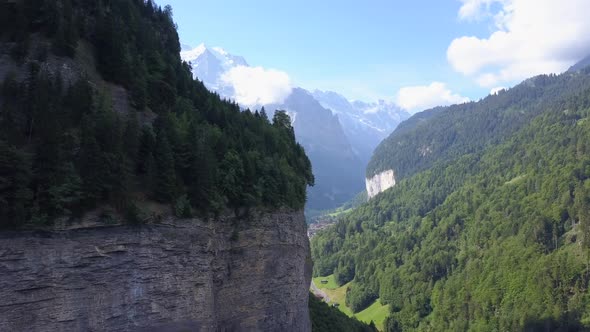 Aerial travel drone view of the Lauterbrunnen Valley, Switzerland.