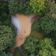 A Drone View From Above on a Round Area Surrounded By Dense Forest - VideoHive Item for Sale