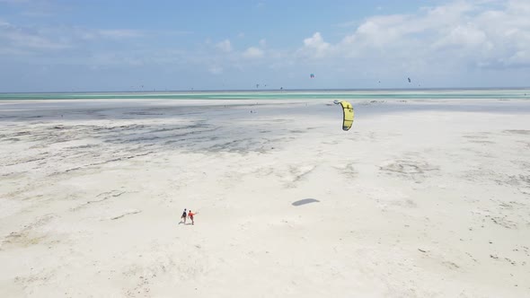 Kitesurfing Near the Shore of Zanzibar Tanzania