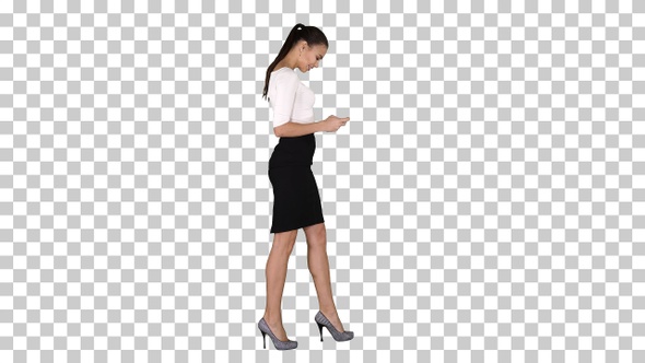 Business woman using smartphone and walking, Alpha Channel