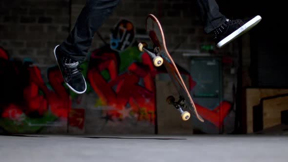 Close up of skater doing 360 flip trick