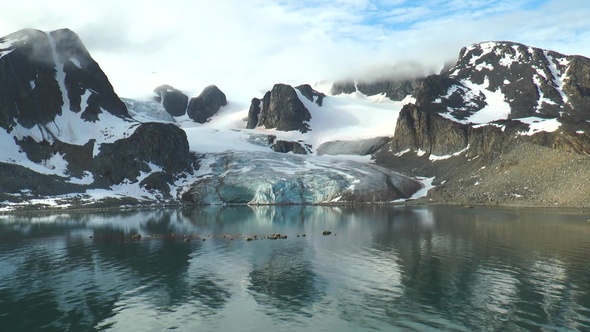 Climate change. Melting glaciers and icebergs in the ocean. Unesco World Heritage Site.