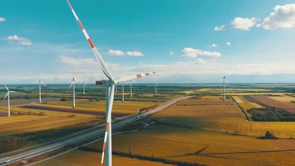 Aerial View of Wind Turbines Farm in Field. Austria. Drone View on Energy Production