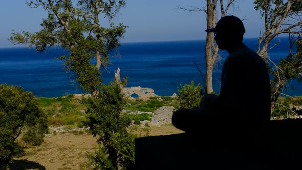 Silhouette Teenager Watching Sea