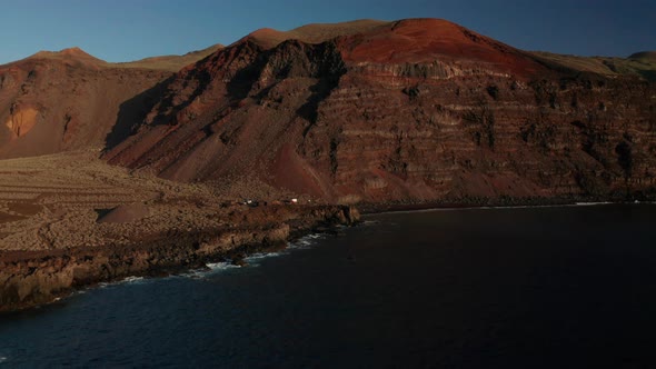 Aerial dolly over the Atlantic coast towards Verodal beach, El Hierro