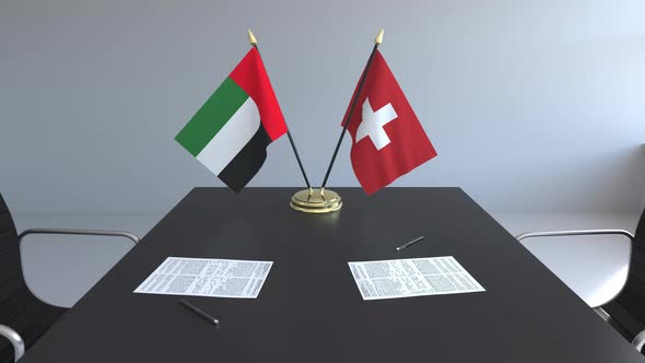Flags of the United Arab Emirates and Switzerland and Papers alt