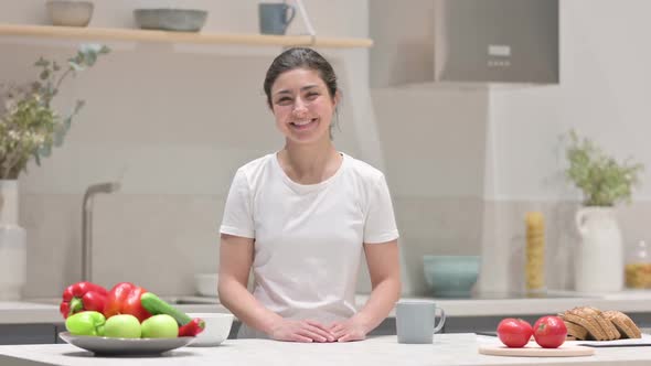 Indian Woman Shaking Head As No Sign While in Kitchen