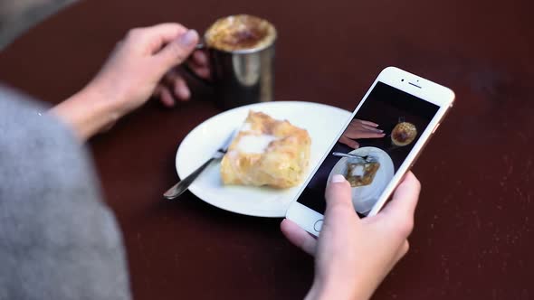 Food Photography. Woman At Cafe Watching Photos On Phone Closeup