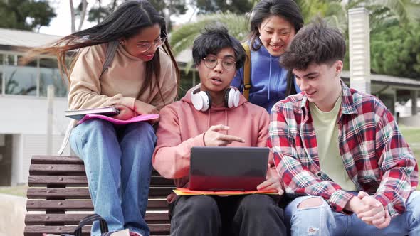 University Student Friends Working Together in the College Campus