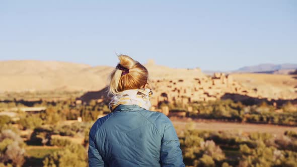 Tourist In Desert And Looking To Ait Benhaddou