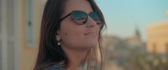 Woman in sunglasses enjoying views