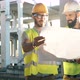 Portrait of Construction Engineers Working on Building Site - VideoHive Item for Sale