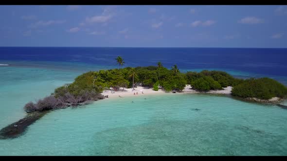 Aerial above nature of paradise coastline beach lifestyle by blue ocean and white sand background of