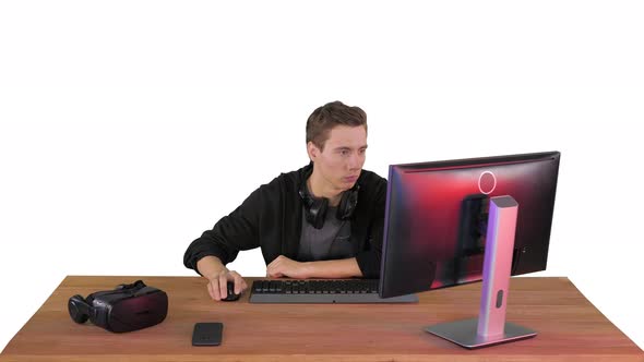 Young Man Gamer Watching Stream Game on White Background