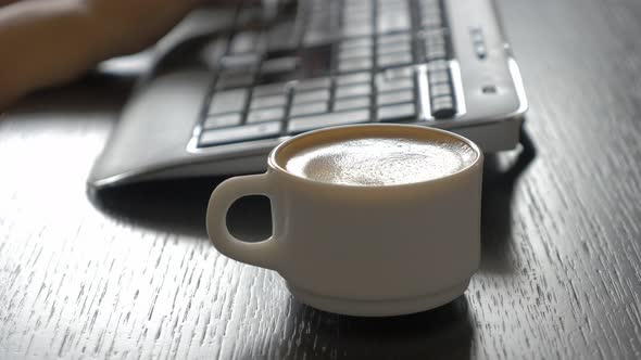 Espresso coffee cup waiting for job being done 4K 3840X2160 UHD footage - Coffee break after typing 
