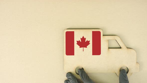 Flag of Canada on the Recycled Cardboad Truck Icon