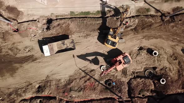Aerial Construction Site with Machinery, Bulldozer, Excavation