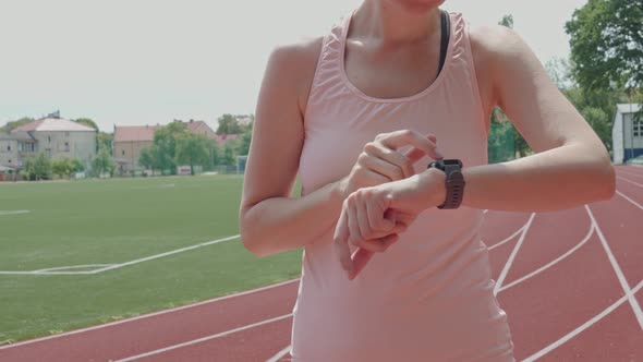 Woman Use Fitness Smart Watch Checking Results After Sport Training