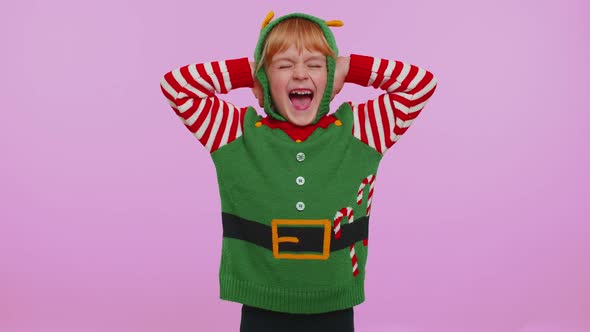 Girl Toddler Christmas Elf Covering Ears and Gesturing No Avoiding Advice Ignoring Unpleasant Noise