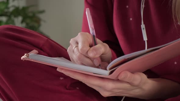 Woman Writing in Diary