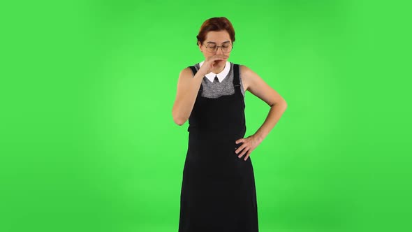 Funny Girl in Round Glasses Is Getting a Cold, Sore Throat and Head, Cough. Green Screen