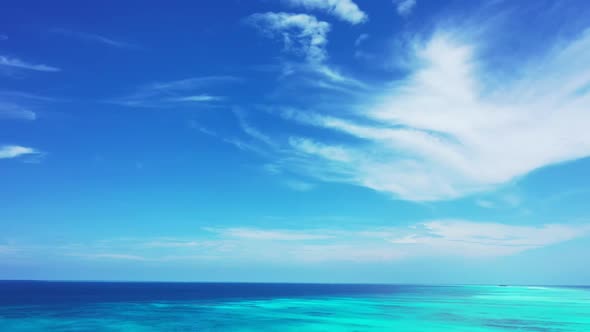 Aerial above travel of paradise tourist beach journey by transparent sea and white sandy background 