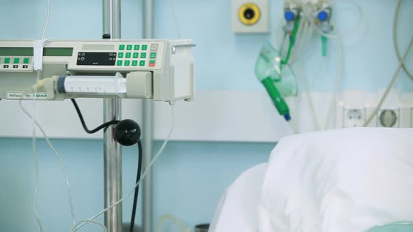 Male patient lying in hospital beds