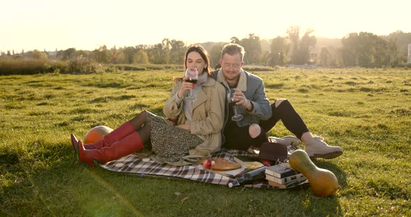 Young Man and a Woman Having a Picnic