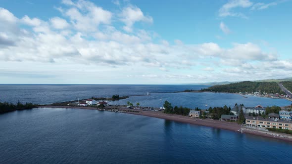 Drone shot of the harbor in Grand Marais in the summer on a sunny day