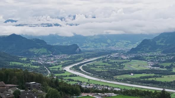 Scenic Panorama of Vaduz Valley By the River Rhine Liechtenstein Alps Mountains