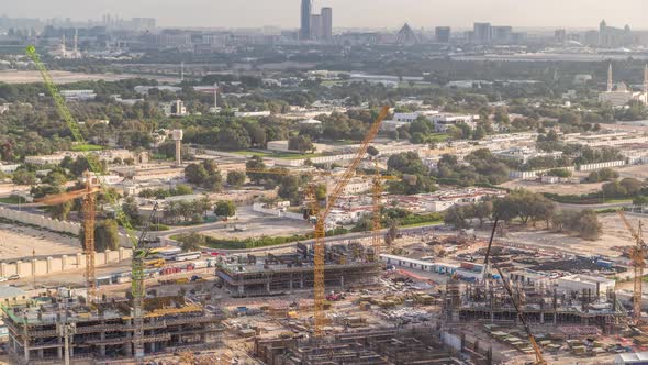 Construction Activity in Dubai Downtown with Cranes and Workers Timelapse UAE