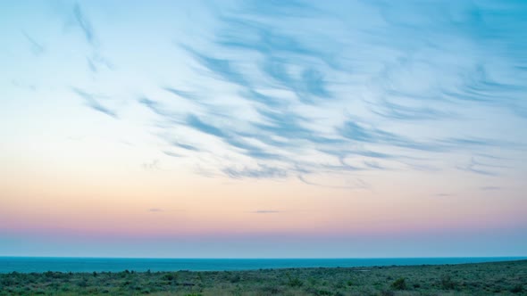 Gentle pastel sky before the dawn of the sun with cirrus clouds