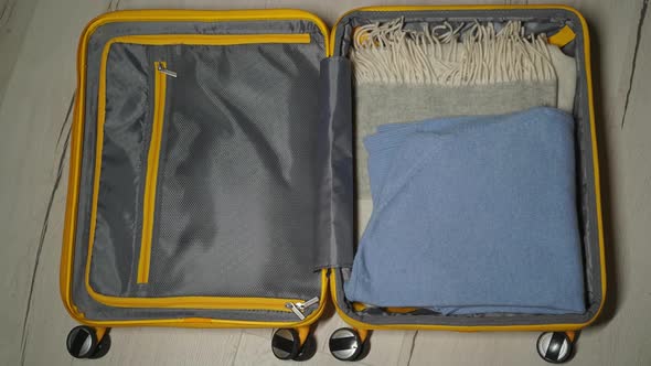 Stop Motion Packing Suitcase