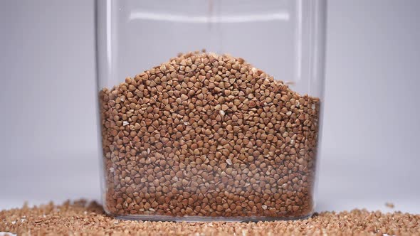 Slow Motion: Buckwheat Fall Asleep in a Jar. Buckwheat in a Jar, a Period of Quarantine, Self