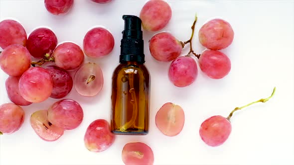 Hair Oil with Grape Seed Extract a Water Background