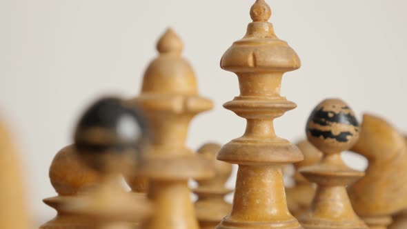 Ancient chess set queen and king wooden figures on playing table  4K 2160p 30fps UltraHD  footage -  alt