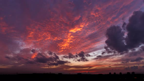 Bright Sunset and Fire two-Layered Clouds.