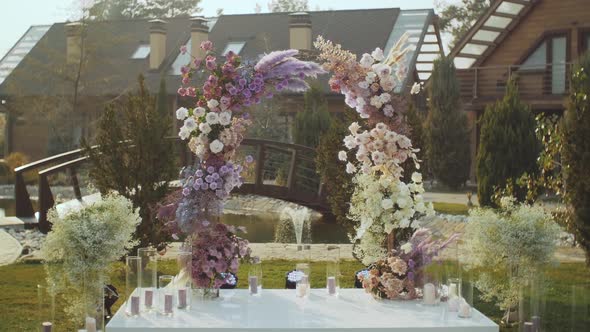 View of Wedding Floral Decorations of Flowers in Pastel Faded Colors Slow Motion Outside Wedding