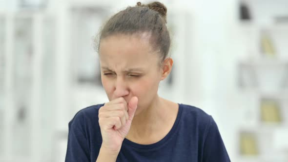 Portrait of Sick African Woman Coughing