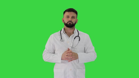 Doctor with a Beard Looking To Camera on a Green Screen, Chroma Key.