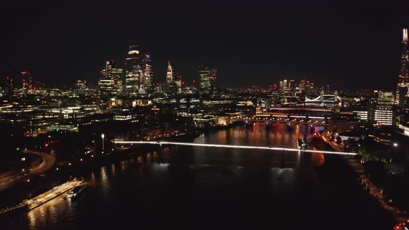 Aerial Night View of Large Town Lit By Thousands of Lights