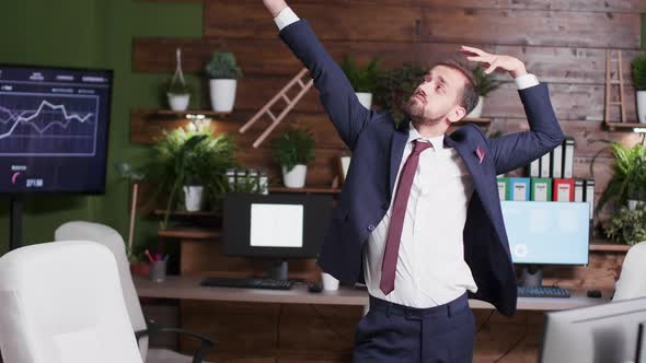 Slow Motion Handheld Shot of Corporate Office Worker Dancing