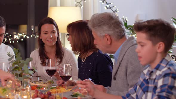 Happy Family Having Dinner Party at Home