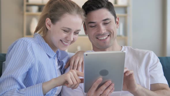 Couple Using Tablet